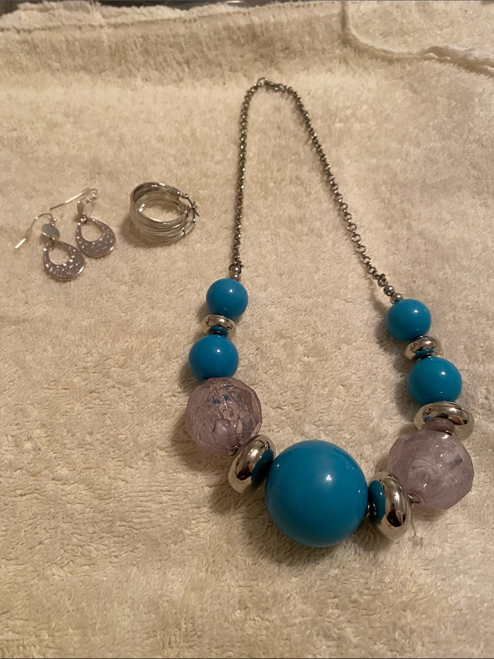 Blue Beaded Statement Necklace with Silver Accents with silver earrings
